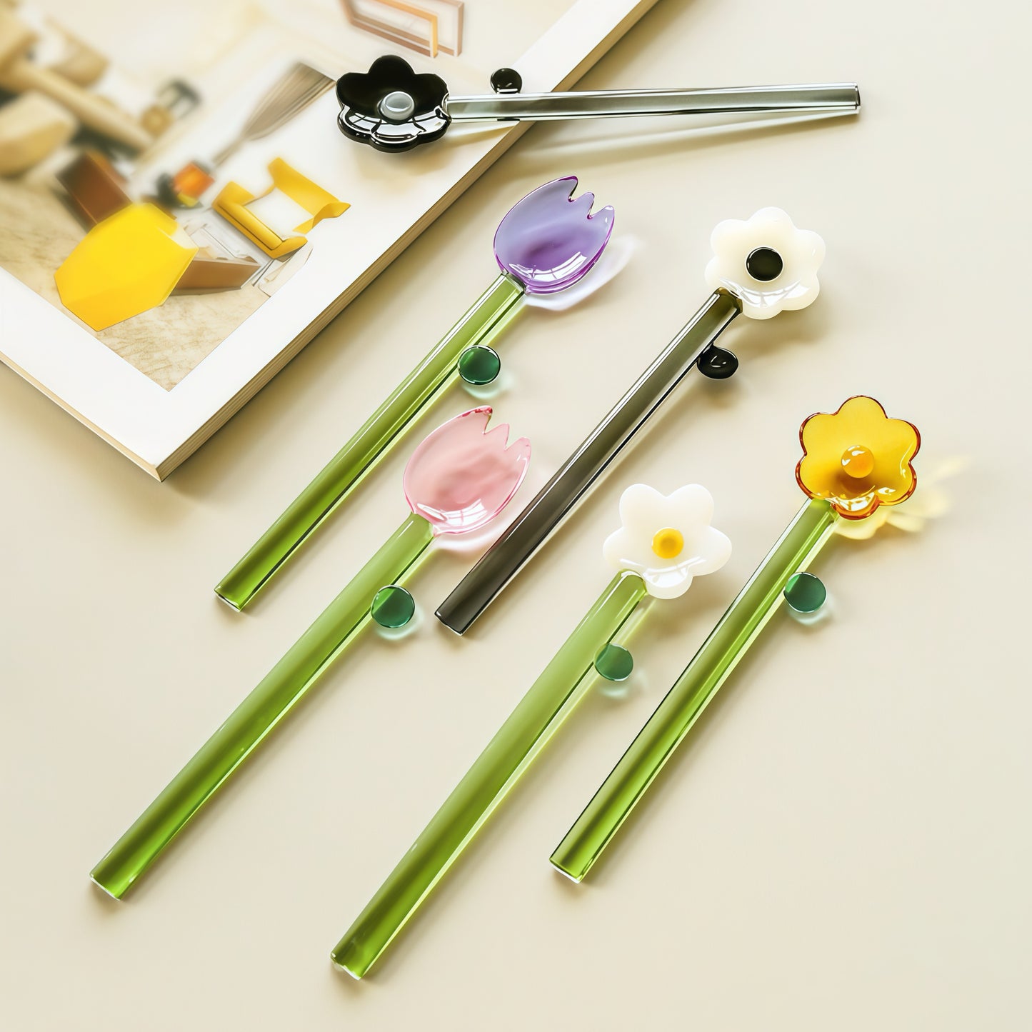 Artisan hand-blown borosilicate glass spoon on a table.