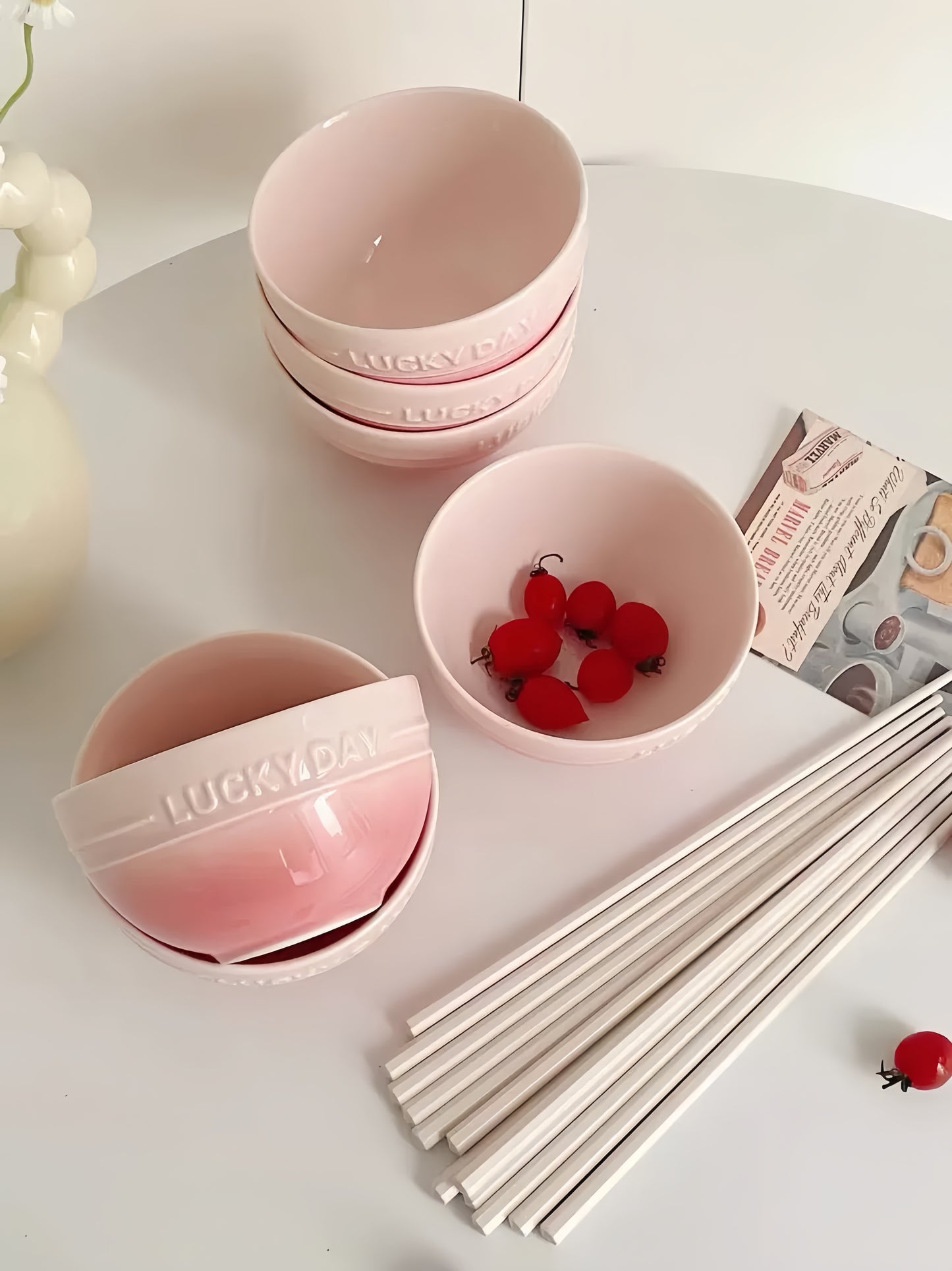 Four minimalist ceramic bowls stacked vertically showing perfect sizing (11.5cm x 6.5cm)