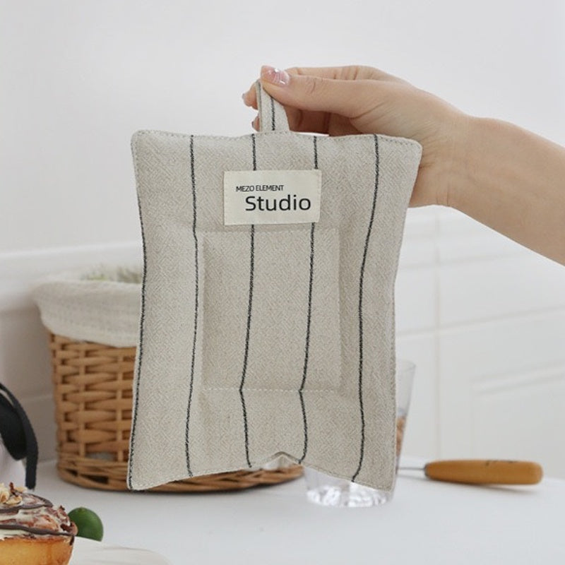 Space-saving linen coasters with hanging loop for vertical or hook storage.
