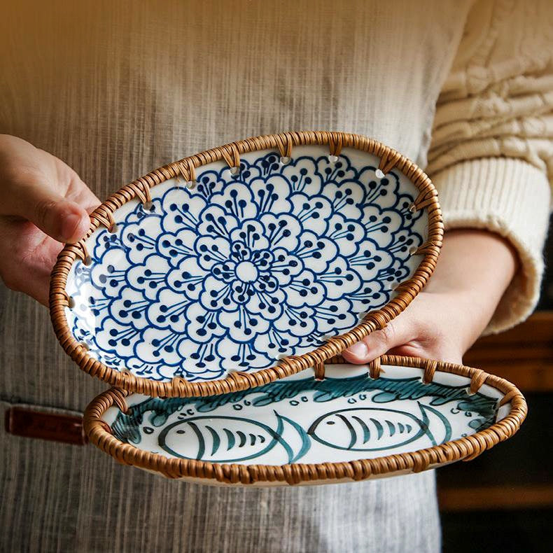 Close-up of hand-painted rattan plate highlighting traditional Japanese craftsmanship