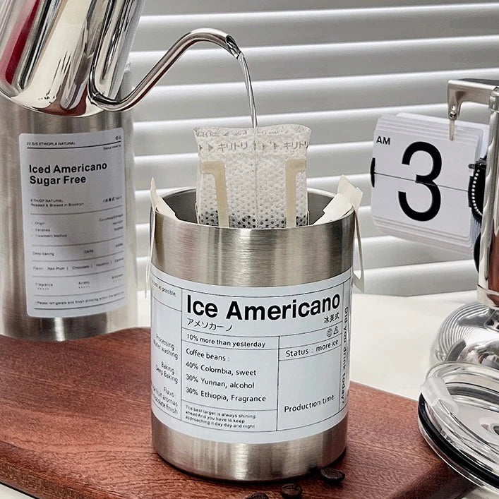 Insulated coffee cup keeping a hot drink warm, perfect for cozy mornings or office use.