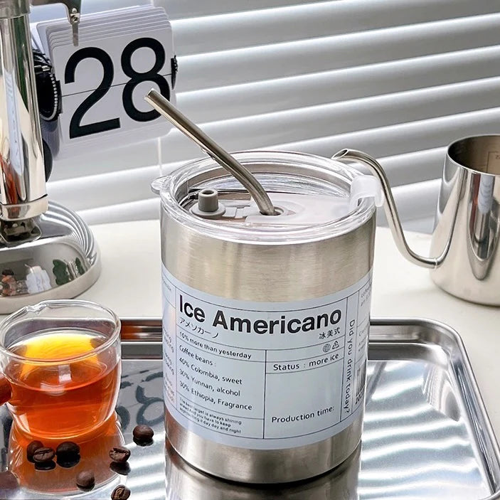 Triple-layer coffee cup on an office desk, perfect for busy workdays.