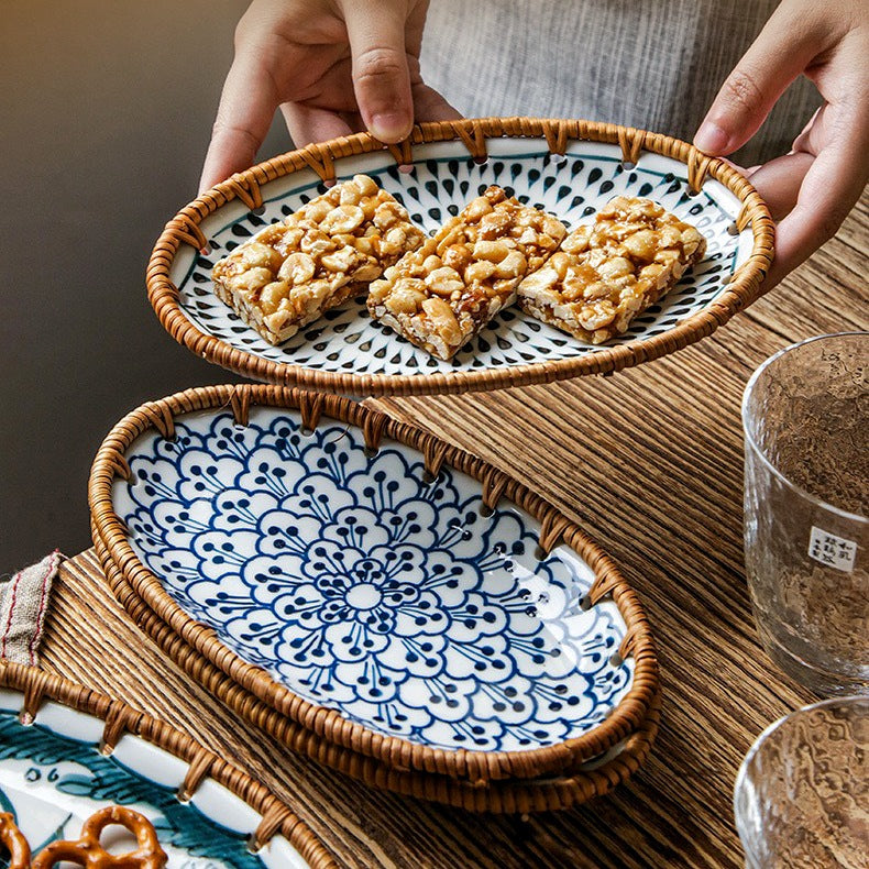 Rattan snack plate filled with colorful finger foods and appetizers for a party