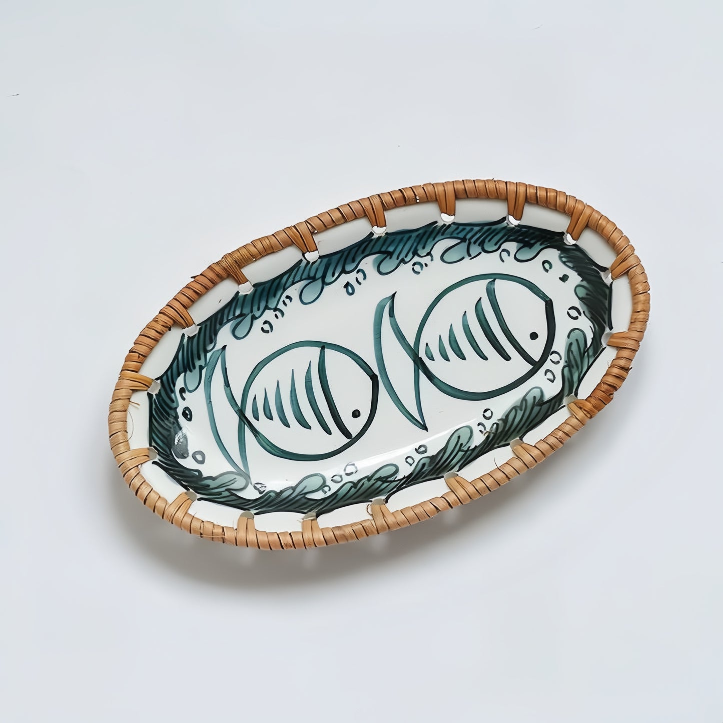 Handcrafted Japanese rattan snack plate showcasing intricate hand-painted patterns and natural textures