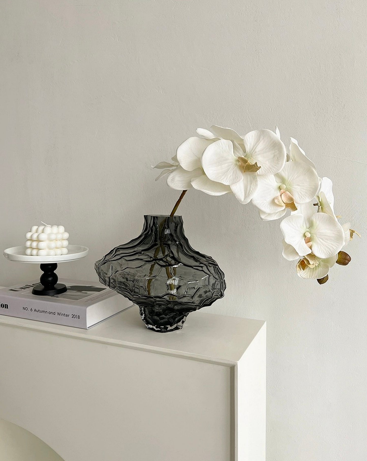 Close-up details of the handmade glass vase, showcasing its unique texture and design.