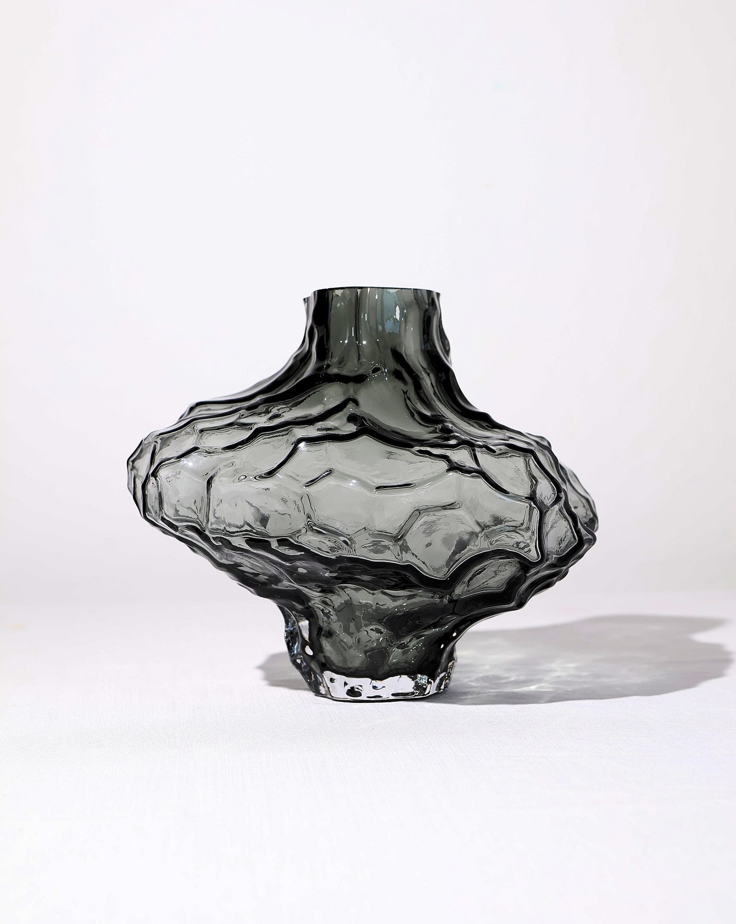 Front view of handmade mouth-blown glass vase inspired by Norway's rocky canyons.