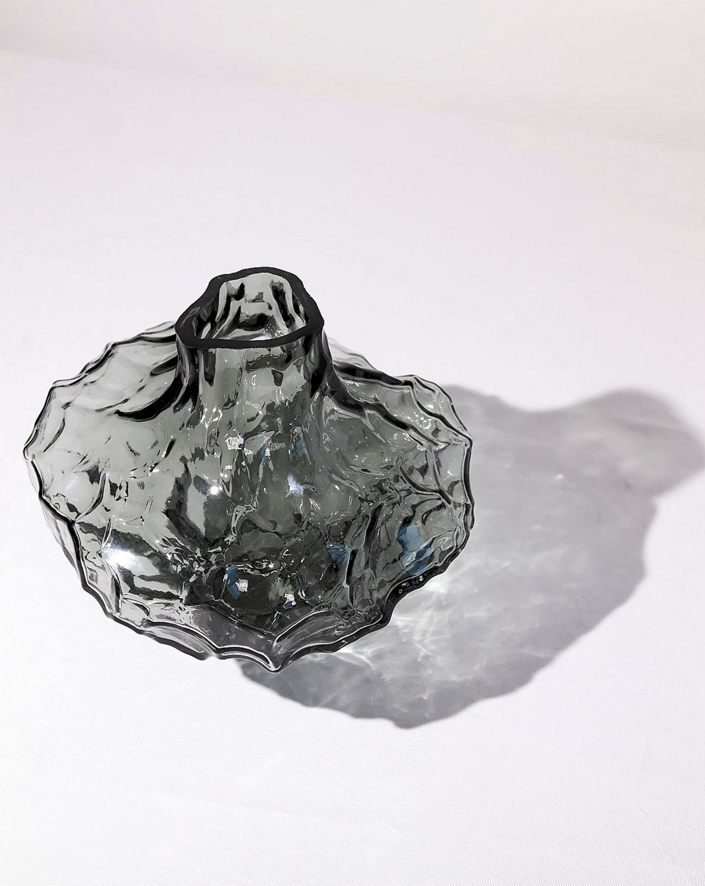 Top view of unique handmade glass vase, highlighting its intricate craftsmanship.