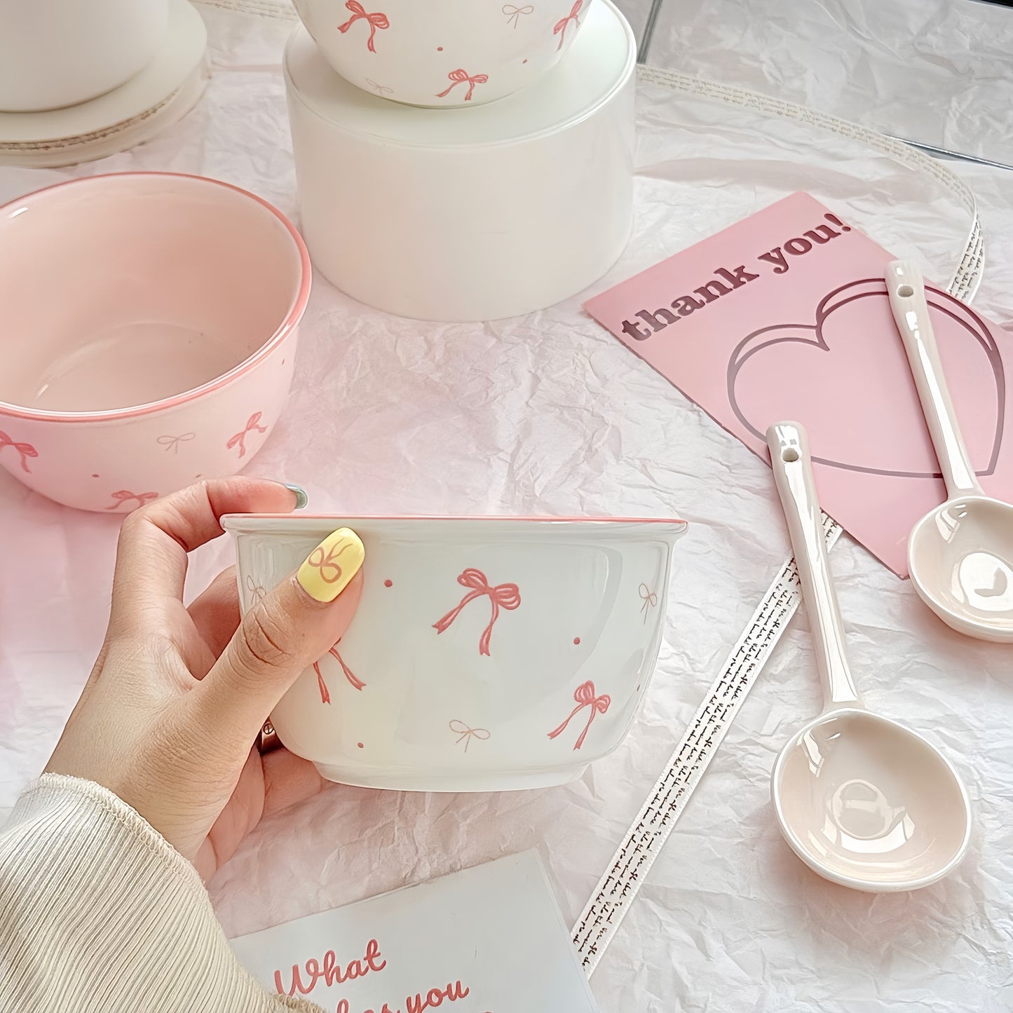 Ceramic bowl and spoon set holding warm soup - stylish kitchenware for meals