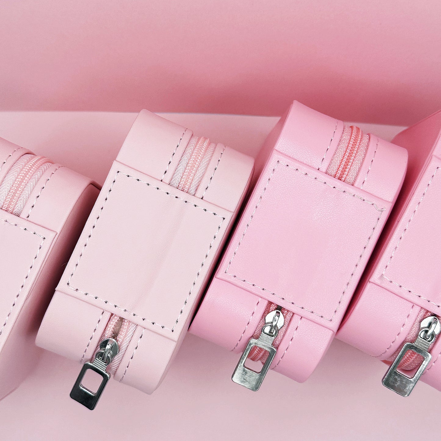Luxurious velvet-lined compartments holding rings, earrings, and bracelets in a compact design