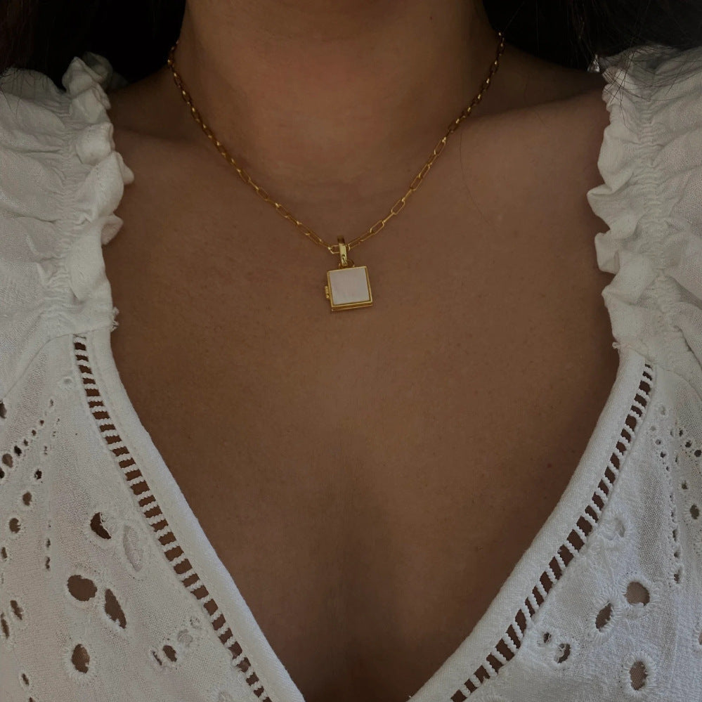 WHITE MOTHER OF PEARL LOCKET NECKLACE