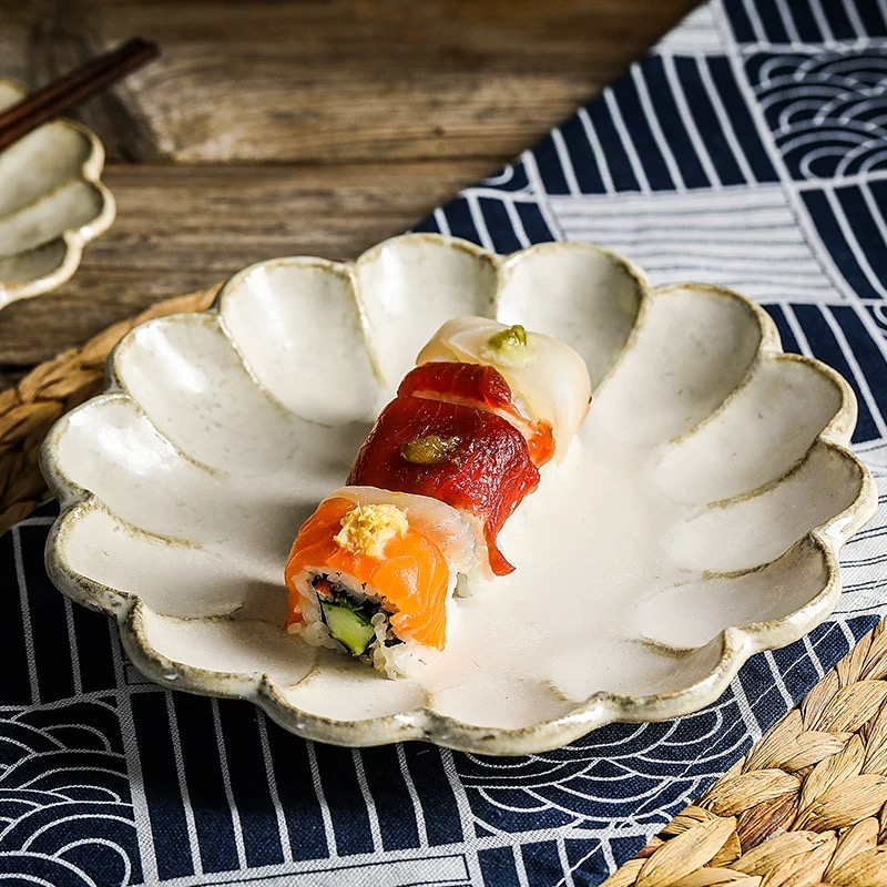 Unique scallop-edged serving dish for appetizers and desserts