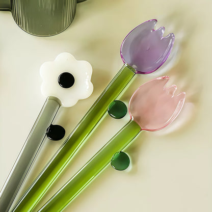 Colorful borosilicate glass spoon scooping vanilla ice cream