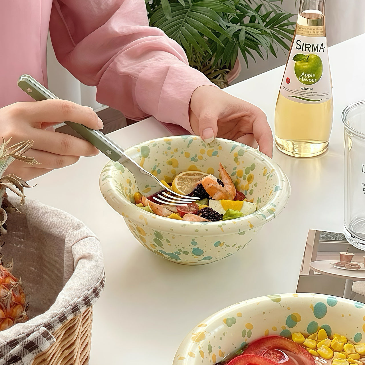 A bowl of steaming tomato soup in a microwave-safe splatter-glazed bowl, perfect for cozy meals.