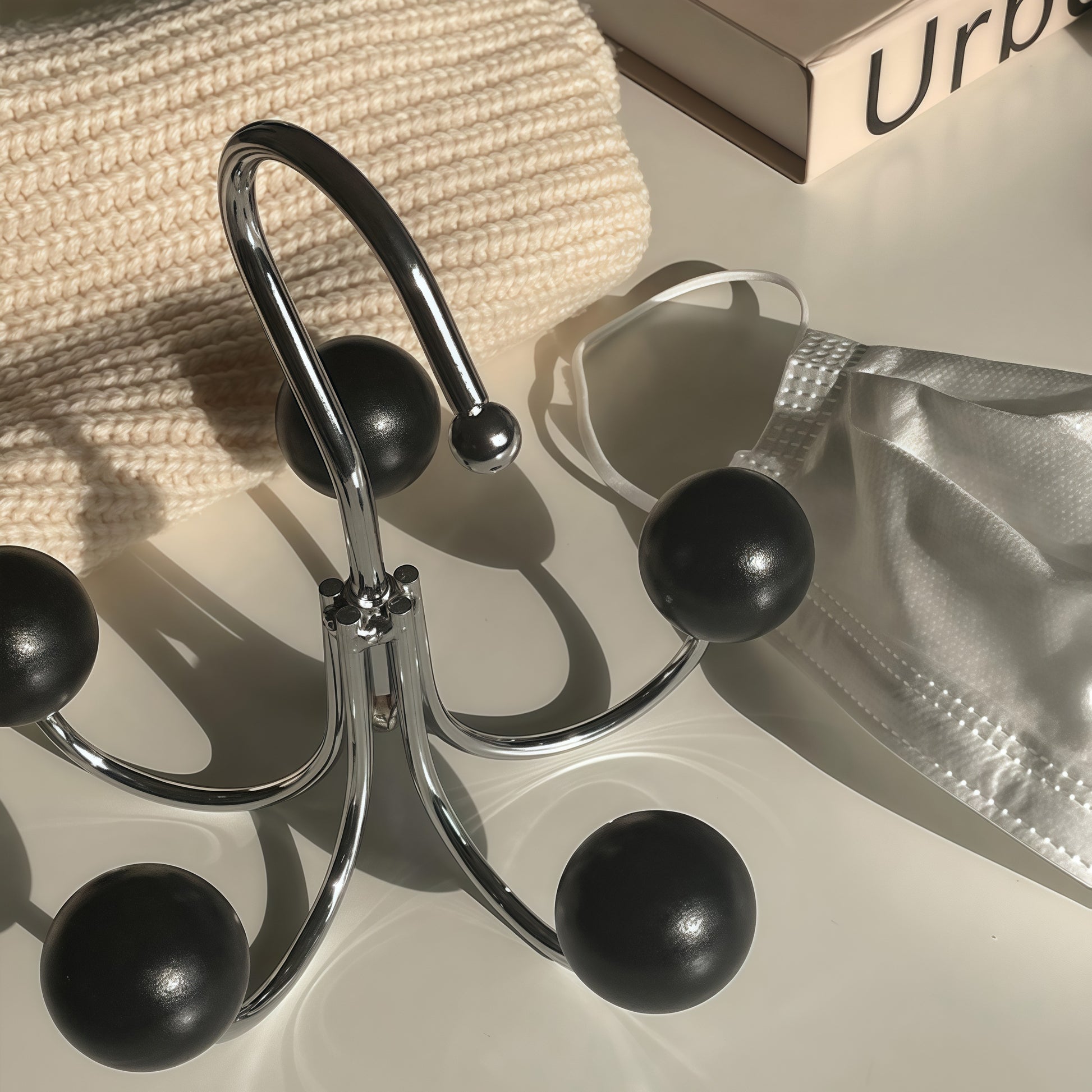 Organize your clothes and accessories effortlessly with our Sphere Rotating Closet Organizer. Featuring a sturdy metal frame, six painted wooden spheres, and a 360° rotating hook, this stylish and durable hanger is perfect for purses, scarves, hats, and more. Ideal for closets, entryways, or bedrooms, it adds elegance and convenience to any space.