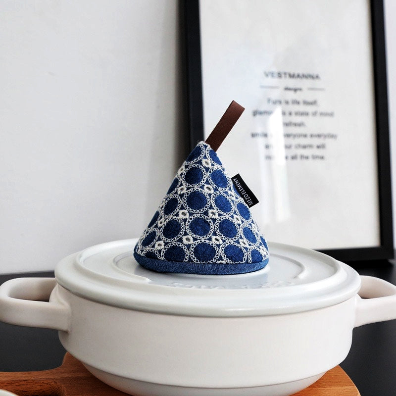 Japanese cotton pot cap with heat-resistant design, showcasing traditional hand-stitched embroidery and vegan leather hanging loop.
