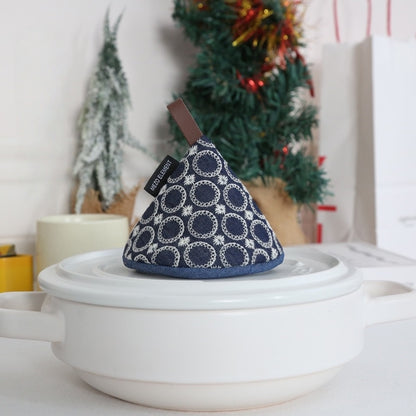  Intricate Japanese-inspired hand-stitched patterns on cotton pot cap, combining aesthetics and functionality.
