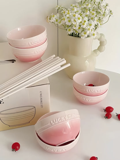 Close-up of ceramic rice bowl in Sakura Macaron Pink with high-gloss gradient glaze
