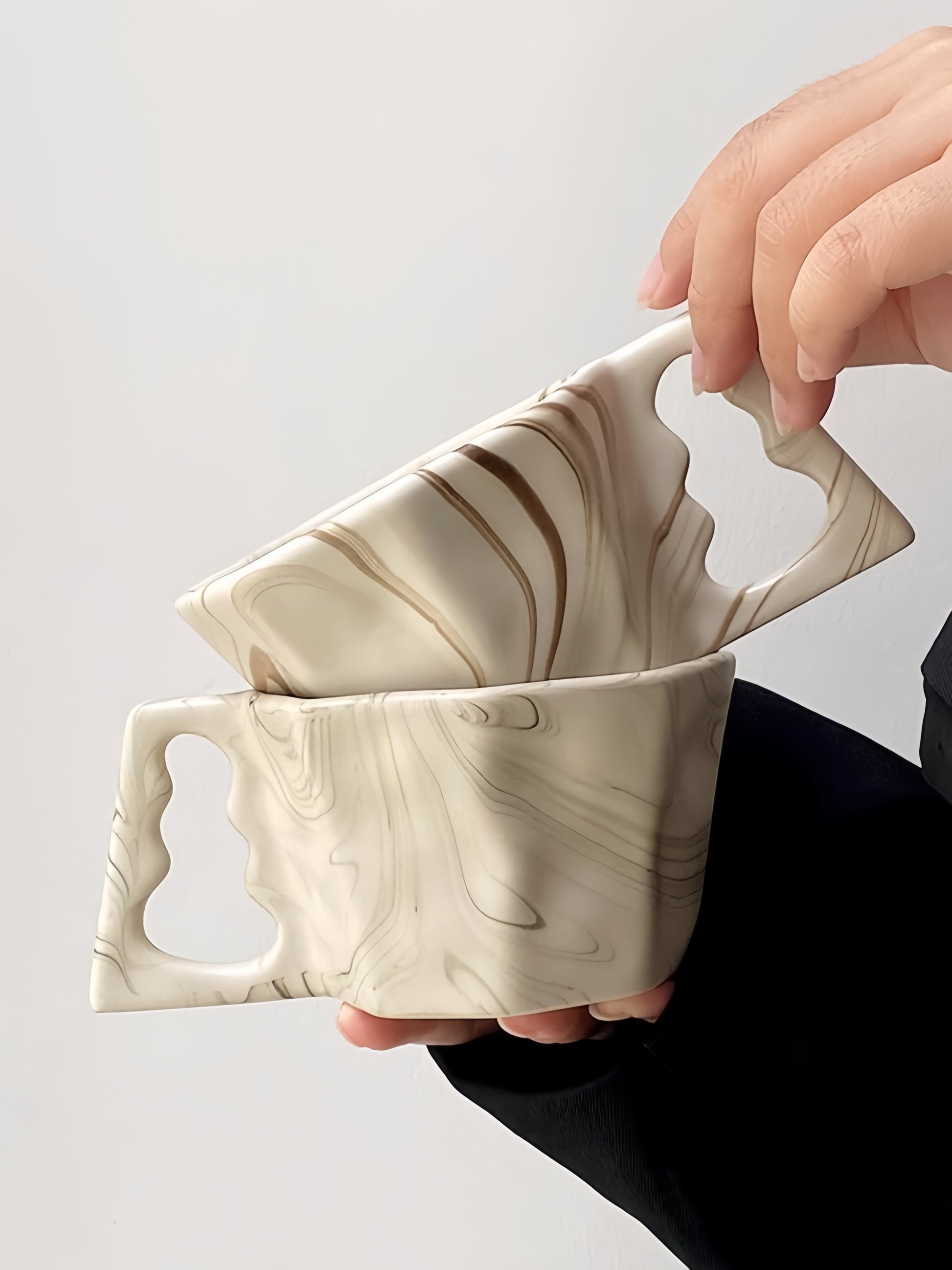 Wide-rim octagonal mug showcasing latte art – perfect for baristas.